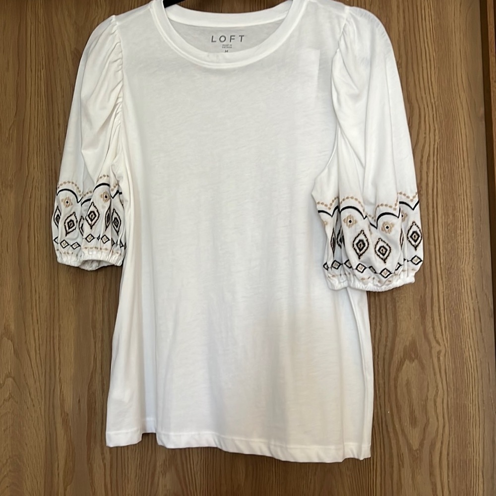 NWT loft top. White with black and tan embroidery.